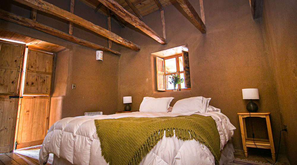 habitaciÃ³n rustica con cama matrimonial